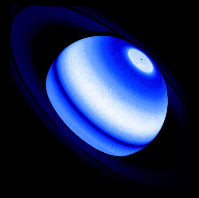 Hubble Discovers Saturn's Rings Warming Its Atmosphere